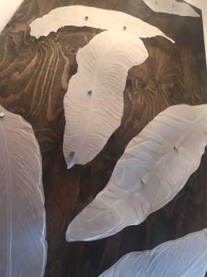 Floating Sandblasted Feathers
